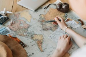 Travel Hack hand on map