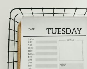 Tuesday deals A minimalist planner displaying a Tuesday schedule with time slots, goals, and to-do sections.